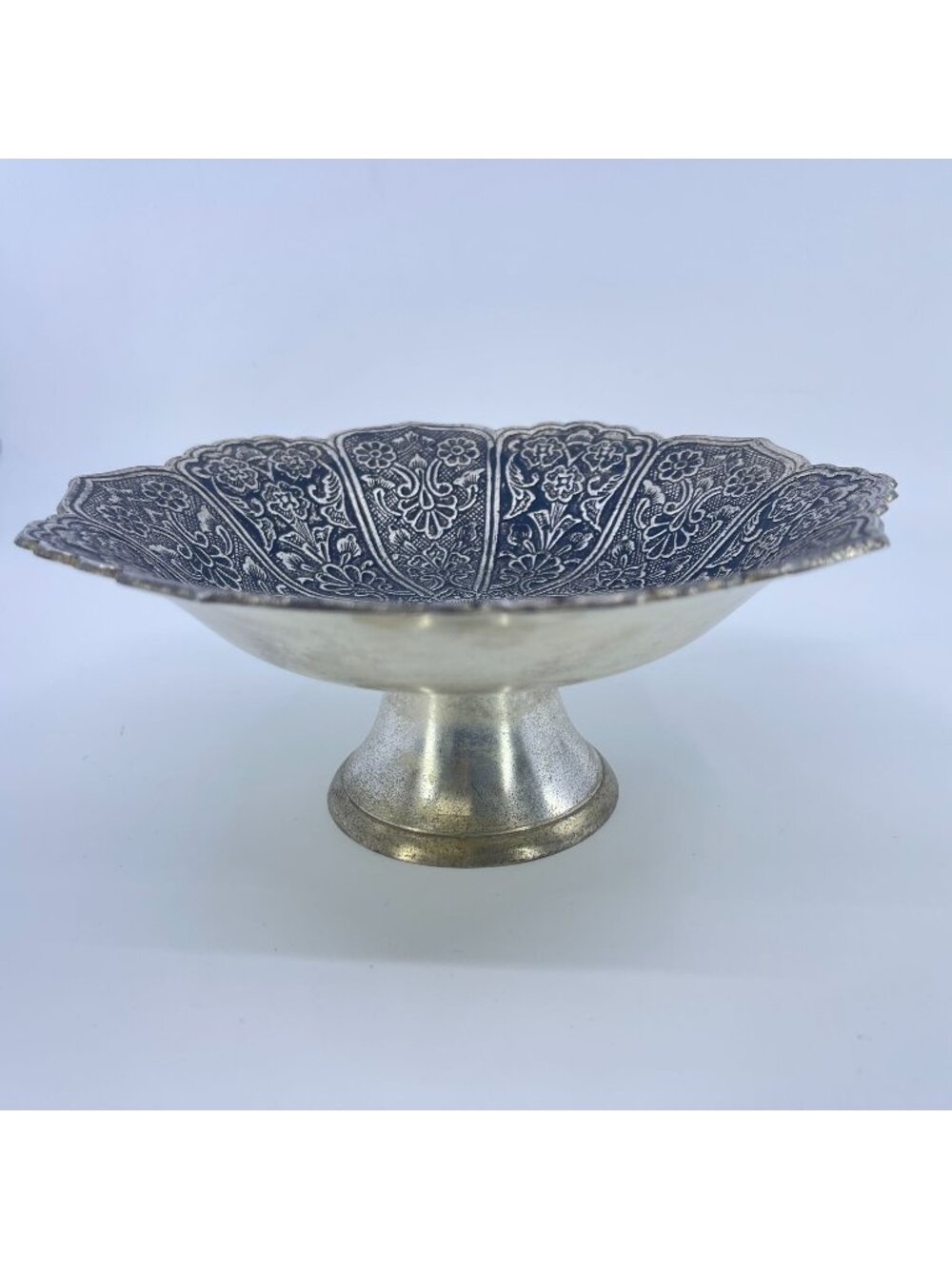 vintage silver tone pedestal bowl with intricate floral engraving scalloped edge